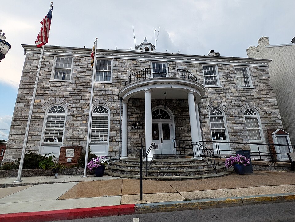 Stone facade and front entrance of Williamsport Town Hall, Maryland.