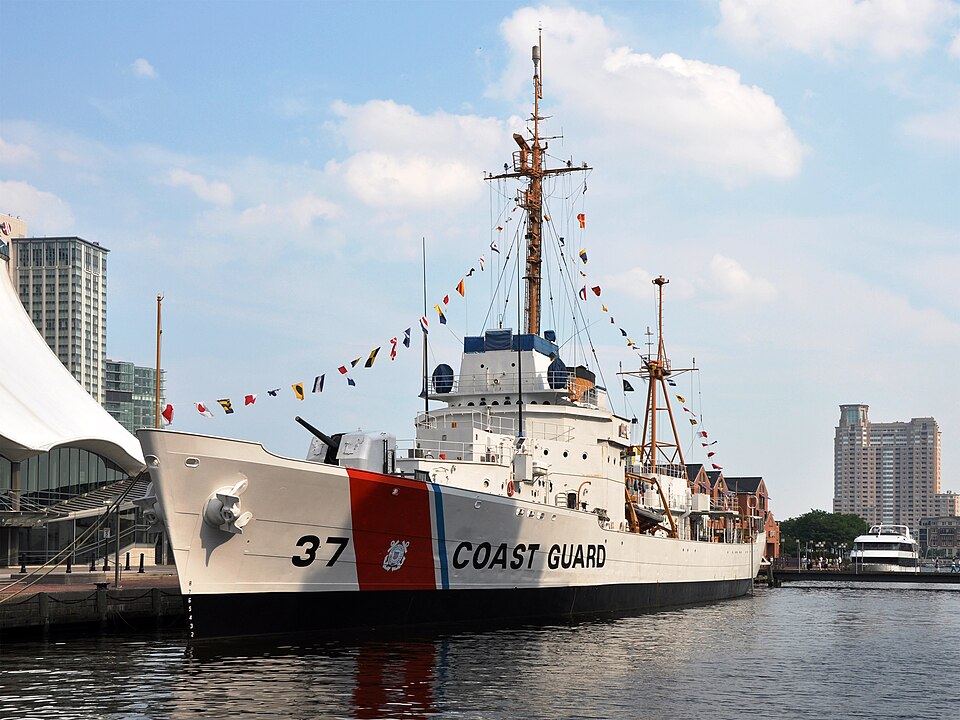 USCGC Taney moored in Baltimore, Maryland, with its Coast Guard markings and hull number 37 visible.
